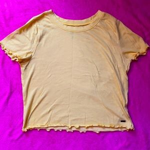 Cropped, yellow tshirt, size medium.